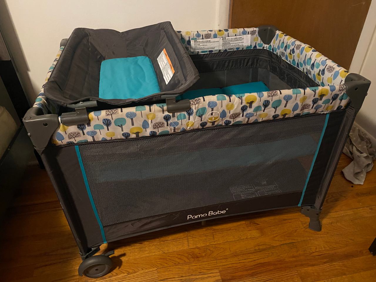 Pamo Babe Deluxe Nursery Center Playard with Changing Table and Bassinet