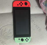 Nintendo Switch with Neon Red/Green Joy-Cons and Splatoon 2 - Image 2