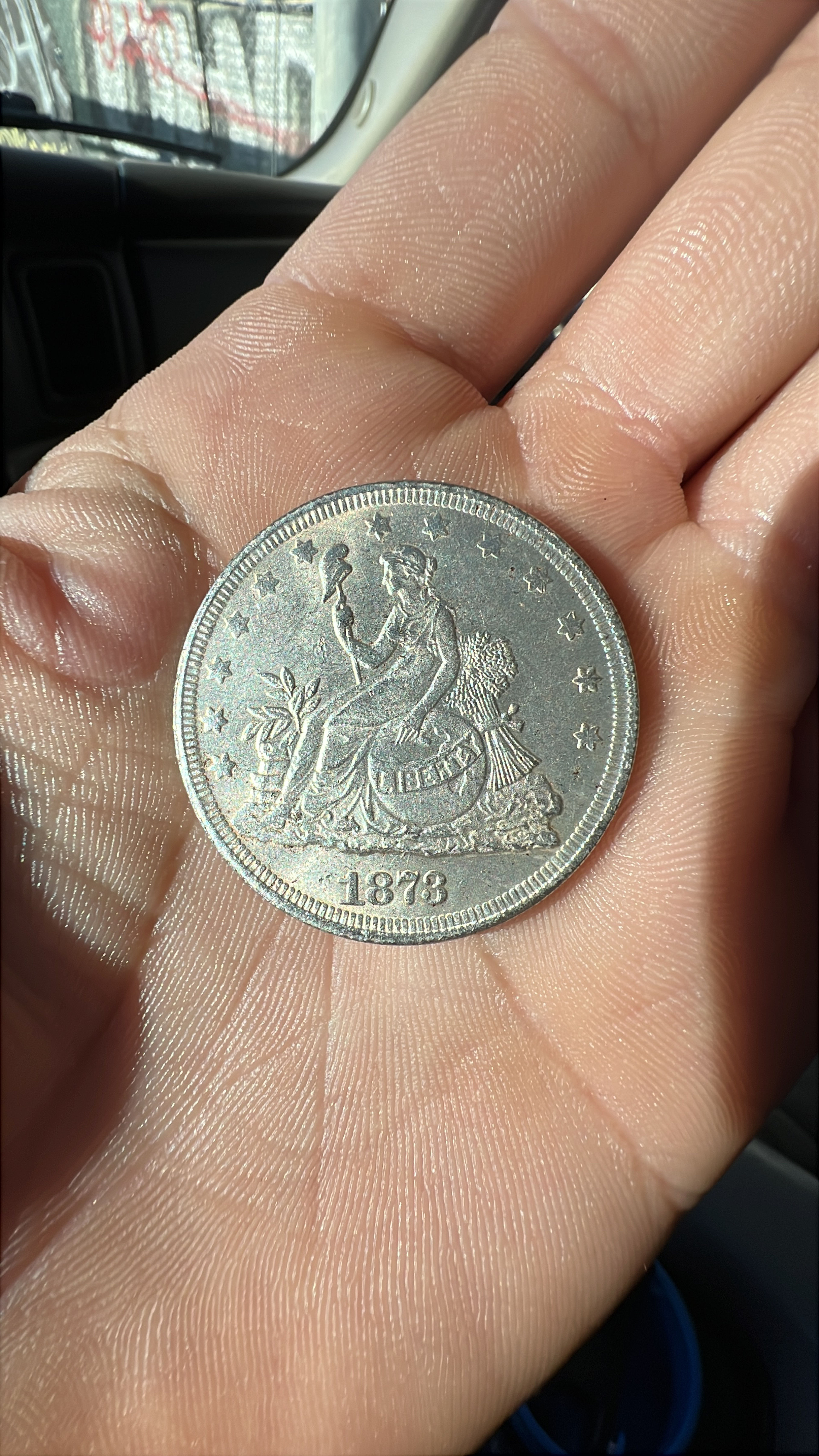 1873 Seated Liberty Dollar