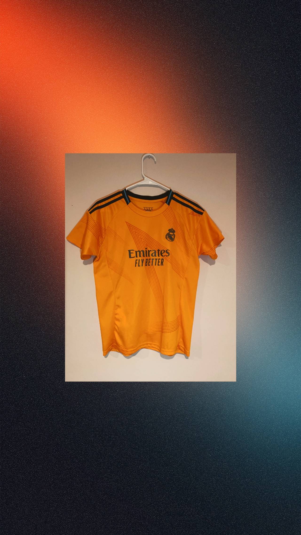 Stand out off the pitch with this official Real Madrid jersey youth 11-13 slim 