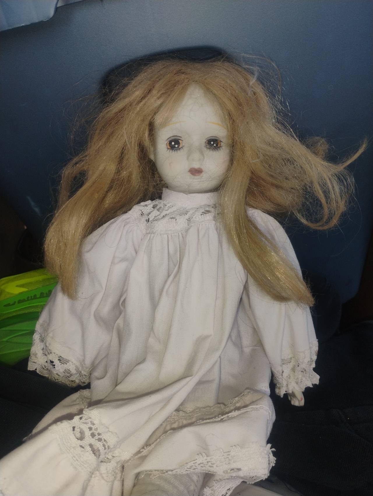 Vintage Porcelain Doll with Blonde Hair and White Dress
