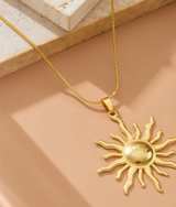 Gold Sunburst Pendant Necklace - Image 1