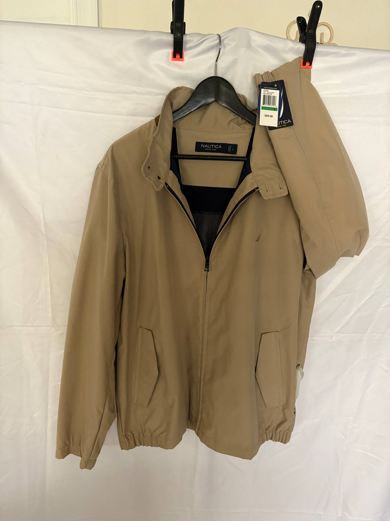 Nautica Men's Classic Windbreaker Jacket. Size L
Khaki Color