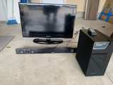 Samsung HW-H450 2.1 Channel Soundbar with Wireless Subwoofer 
And Samsung tv - Image 1