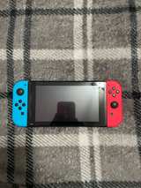 Nintendo Switch Neon Red/Neon Blue - Image 1