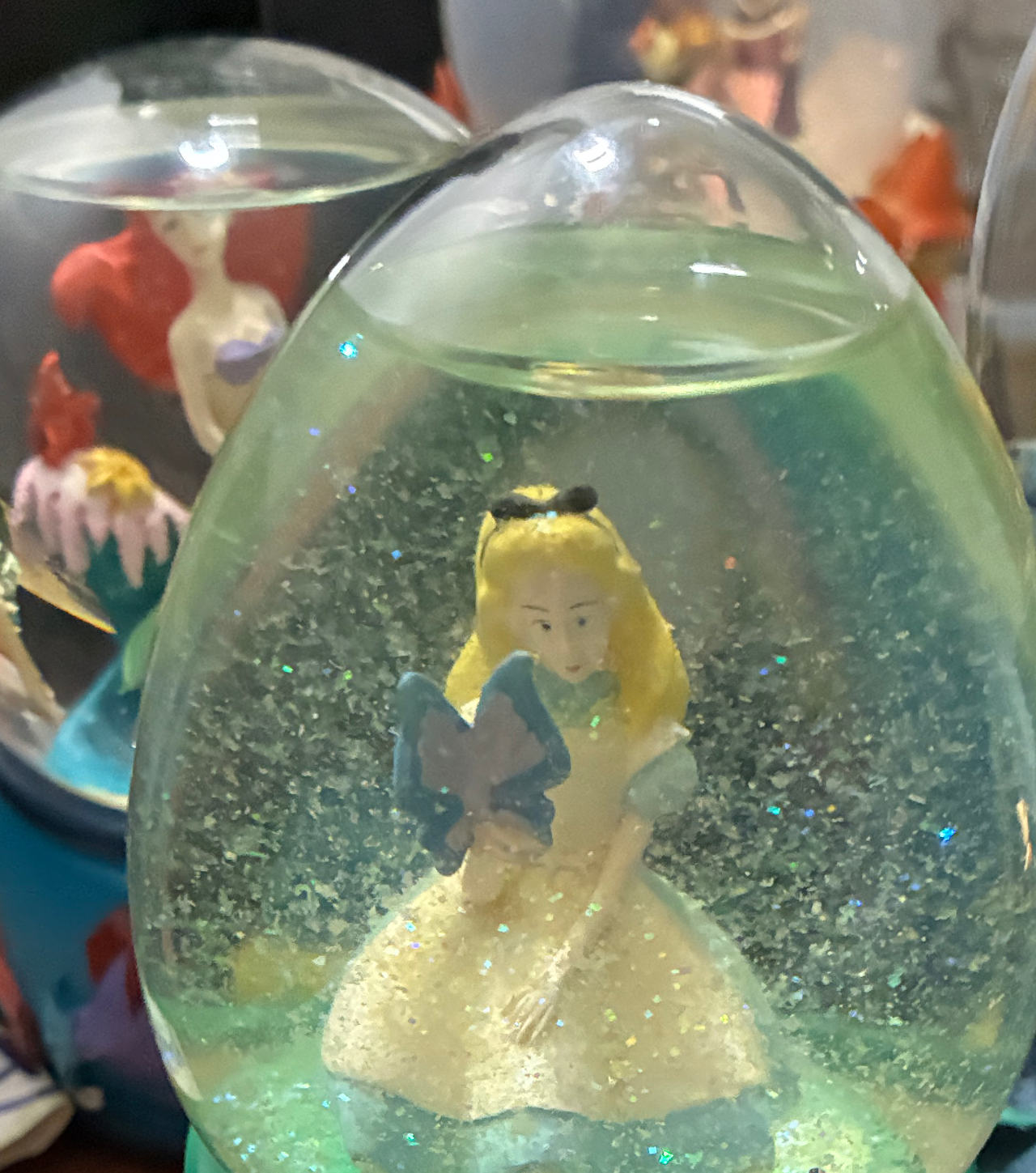 Disney Alice in Wonderland Egg Shaped Snow Globe