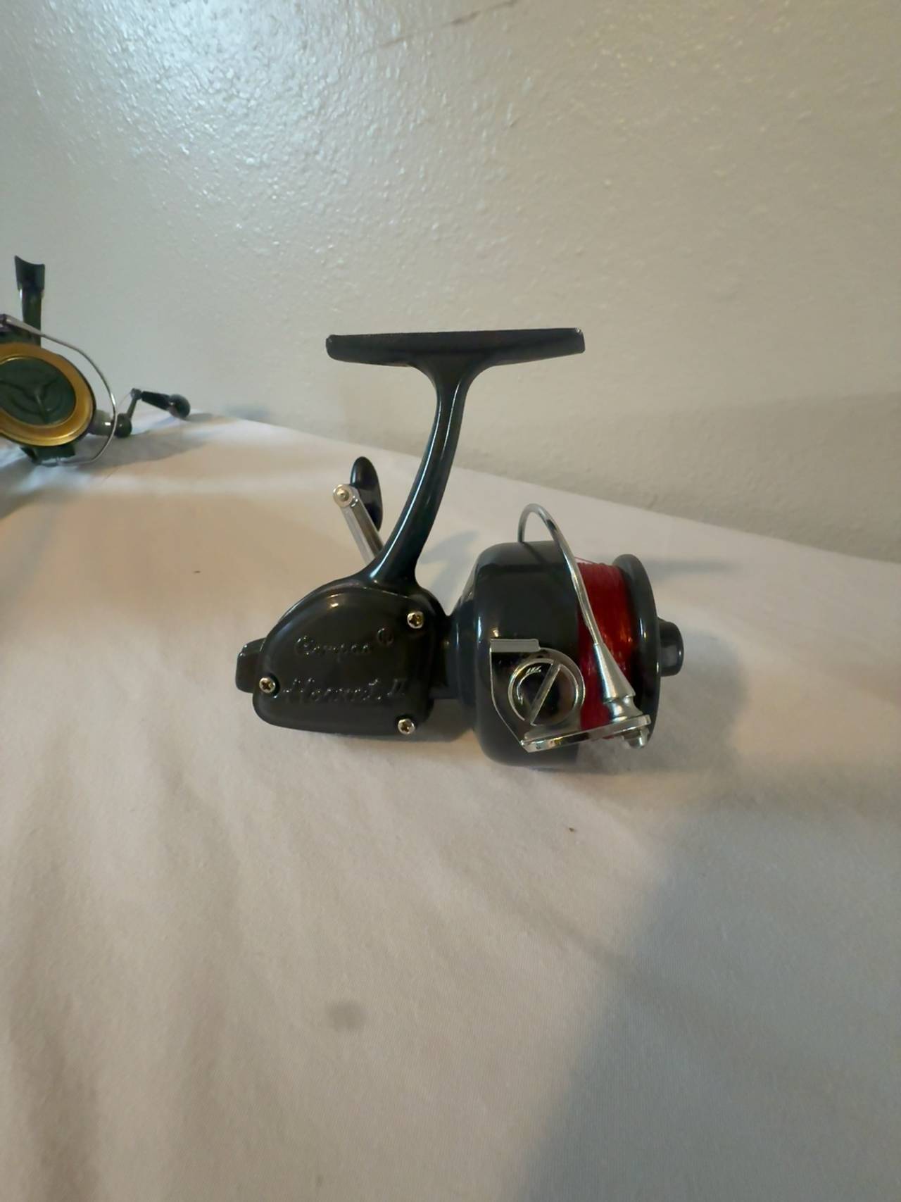 Never used Vintage Compac Hornet  ll Fishing Reel. Few minor scratches.
