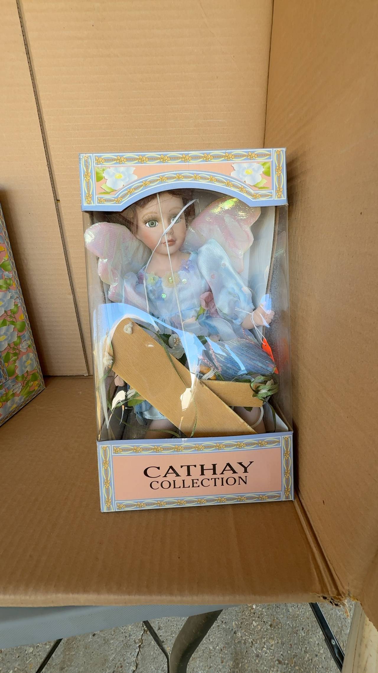 Cathay Porcelain Fairy Doll on Swing – Plum Dress