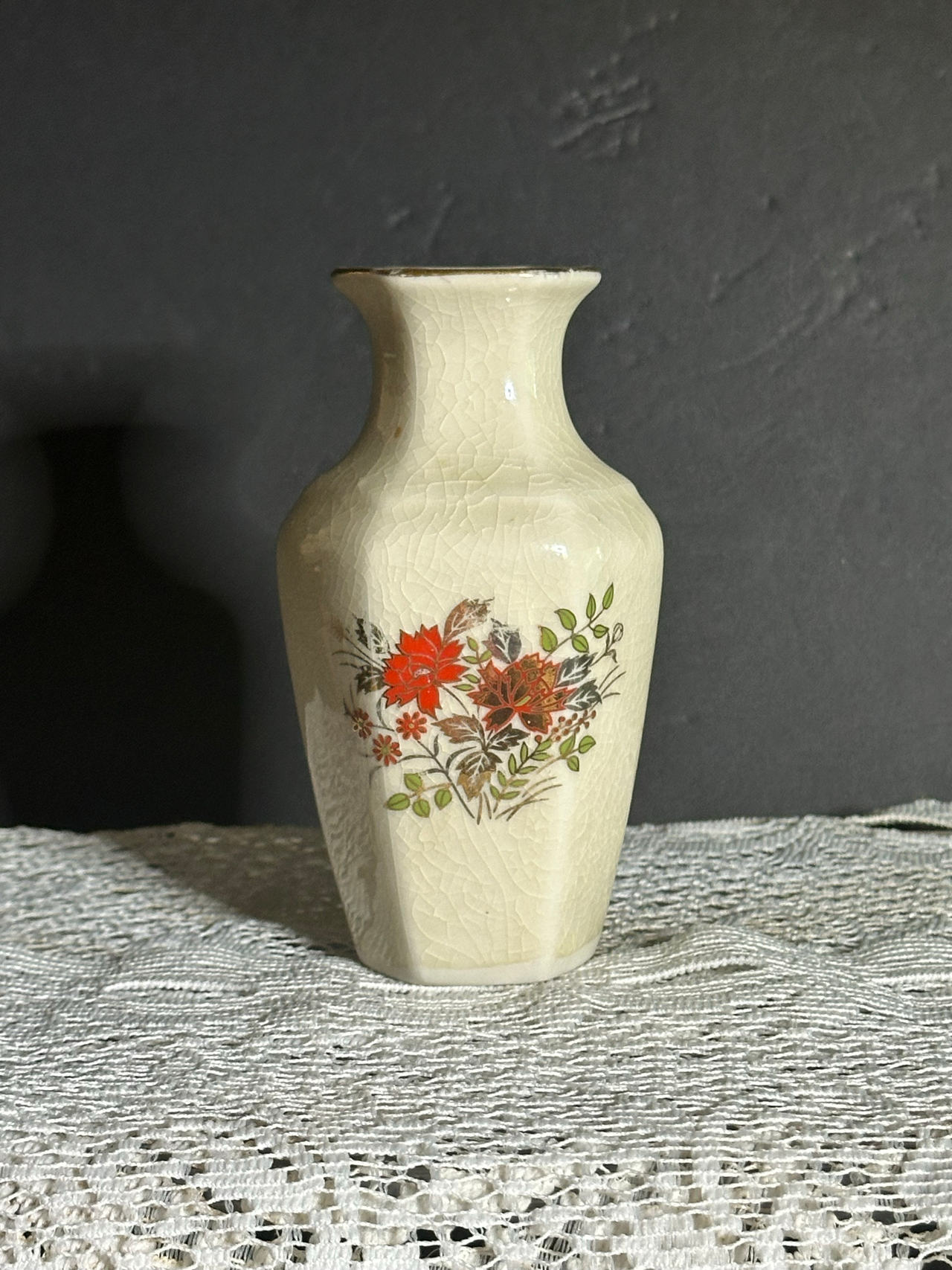 This is a Vintage Japanese Porcelain Bud Vase featuring a Hexagonal Shape.