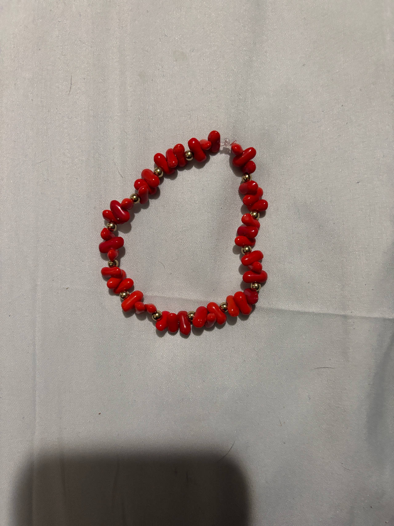 Red Coral Chip Stretch Bracelet with Gold Beads