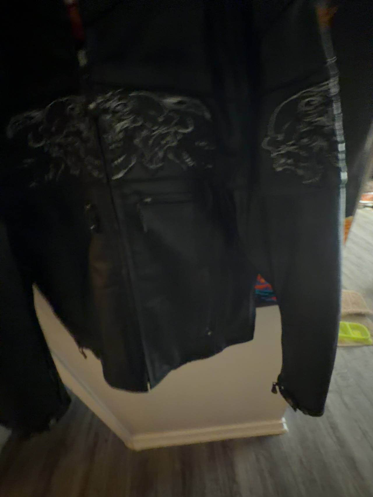 Xelement Men's Black Leather Motorcycle Jacket with Reflective Skulls