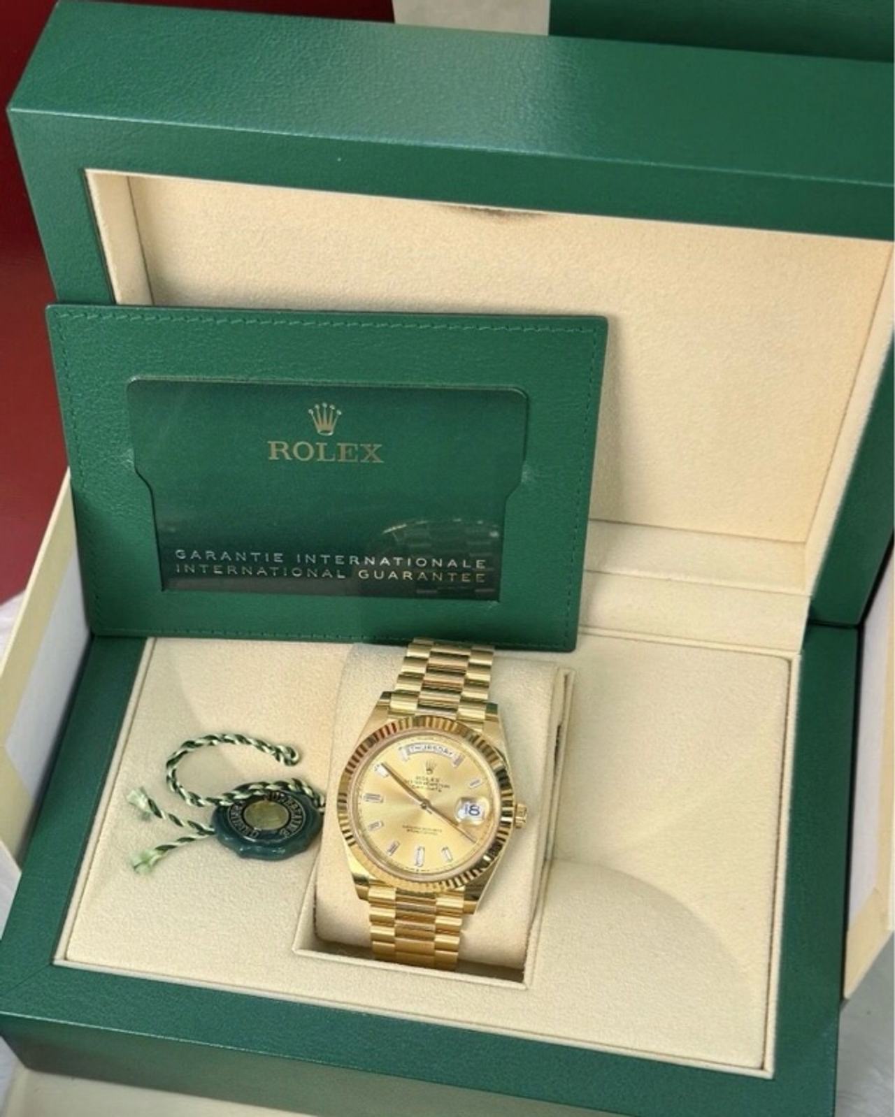 Rolex Day-Date 40 228238 Yellow Gold Champagne Baguette Dial