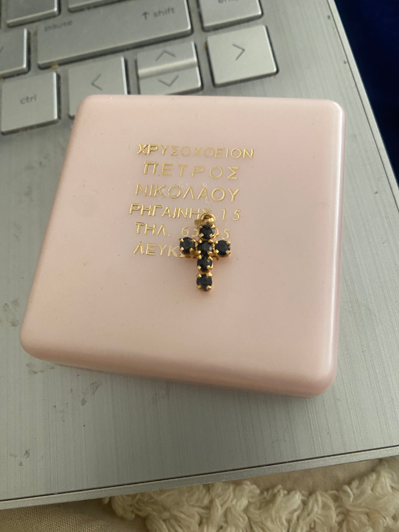 Gold Cross Pendant with Black Stones