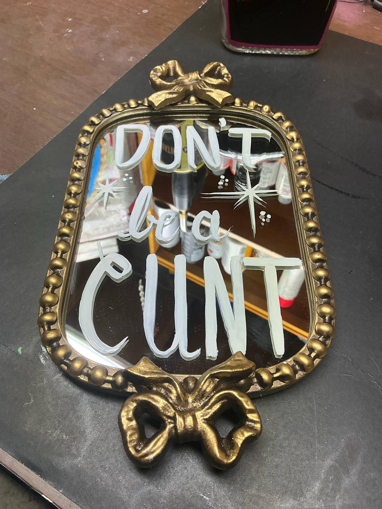 Decorative Vintage-Style Mirror with Painted Quote