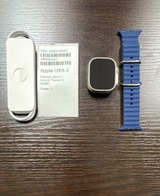 Apple Watch Ultra 2 (GPS + Cellular, 49mm) Natural Titanium Case with Blue Ocean Band - Image 1