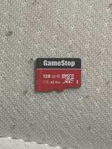 Nintendo Switch with Neon Red/Green Joy-Cons and Splatoon 2 - Image 3