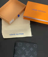 Louis Vuitton Multiple Wallet Monogram Eclipse - Image 1