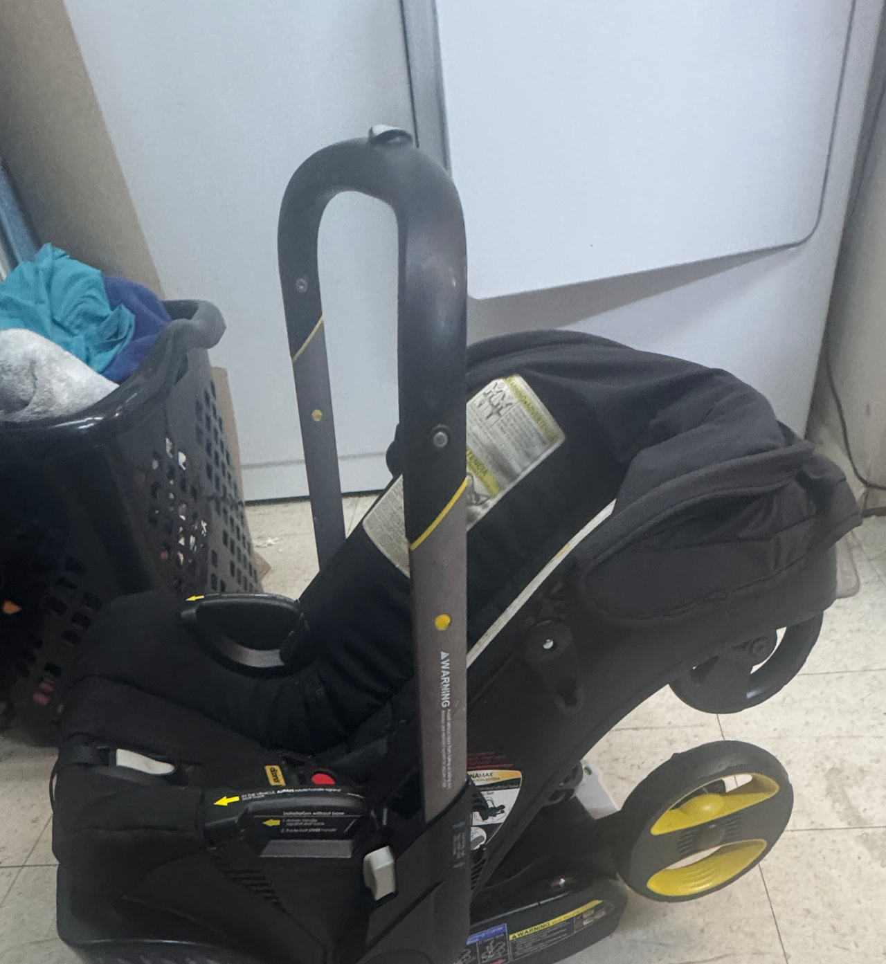 Doona Infant Car Seat/Stroller + Canopy + travel Bag + Dock