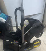 Doona Infant Car Seat/Stroller + Canopy + travel Bag + Dock - Image 1