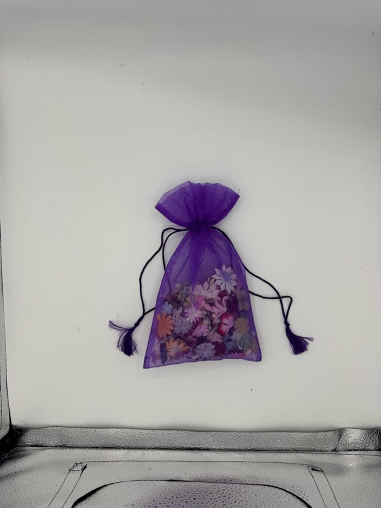 Prima Marketing Full Bag of Assorted flowers in Purple Mesh Bag