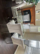 Glass Dining Table with Upholstered Chairs Set - Image 1