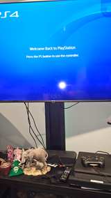 Sony PlayStation 4 Slim Console Bundle with 2 Controllers - Image 1