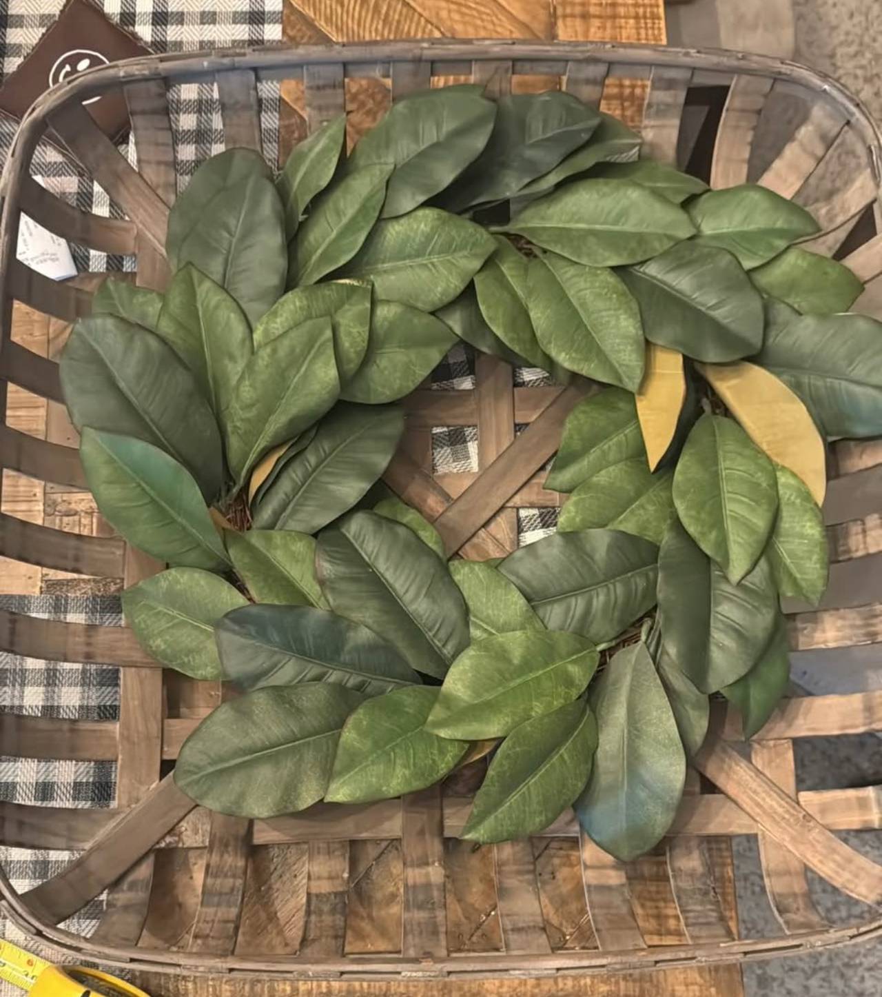 Artificial Magnolia Leaf Wreath in Tobacco Basket