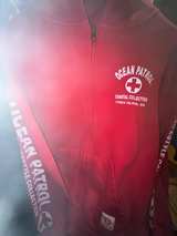 Ocean Patrol Red Hoodie small
Tube island - Image 2