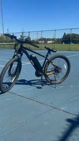 Racer Ultra Step-Over
Full-Suspension
Mountain eBike
 - Image 1