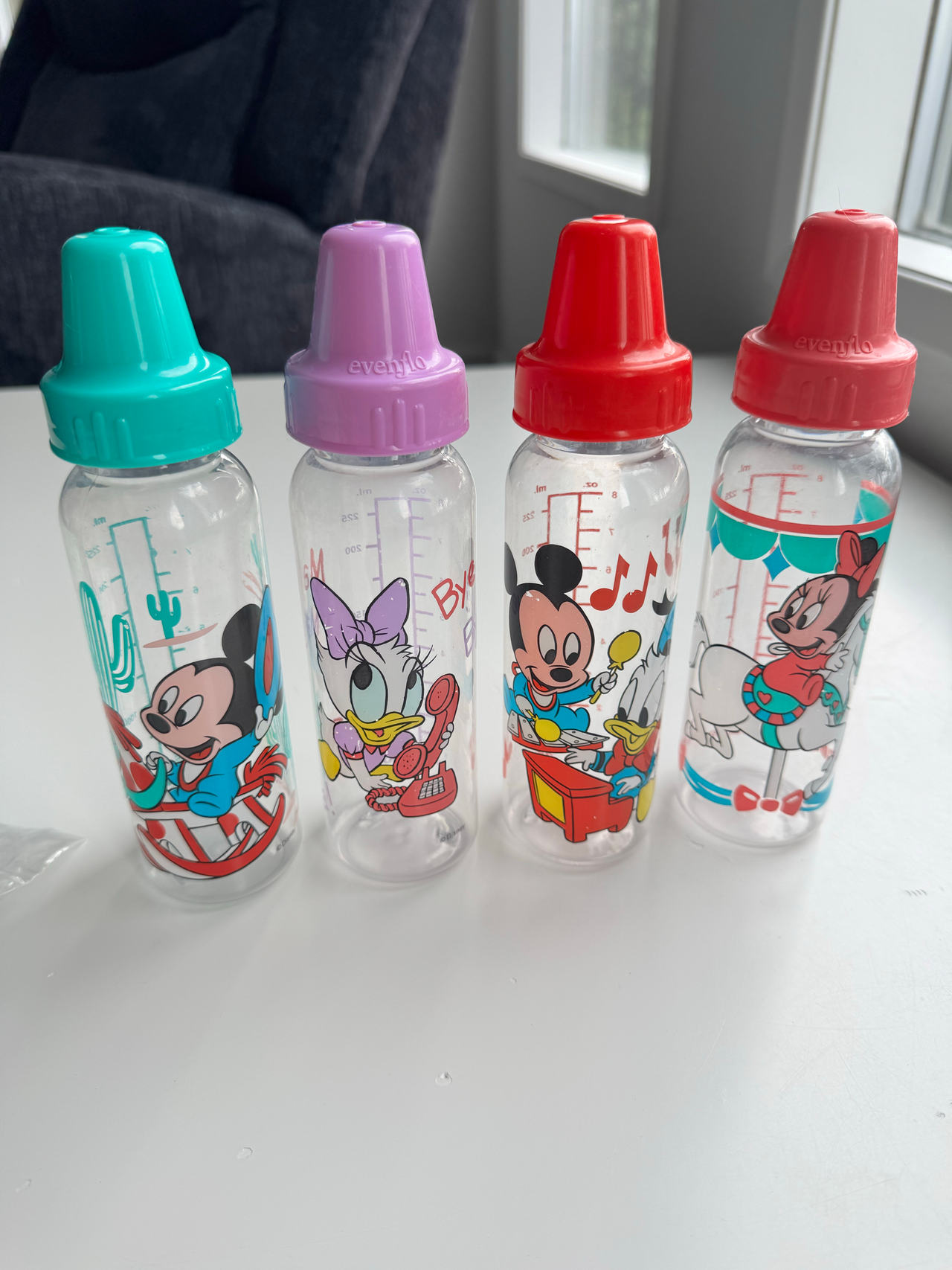 Evenflo vintage Baby Bottles with Disney Characters