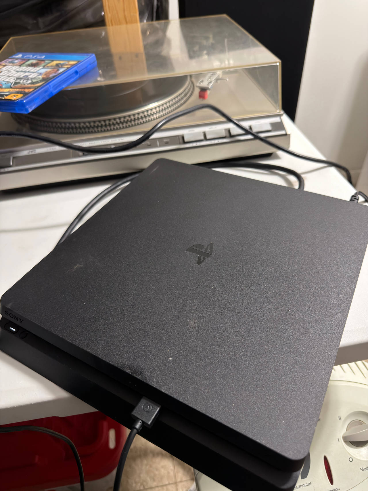 Sony PlayStation 4 Slim 500gb with power cord and hdmi includes pre-saved games.