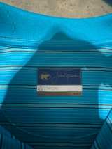 Unworn Jack Nicklaus Stay Dri Golf Polo Shirt Blue/Black Striped. - Image 1
