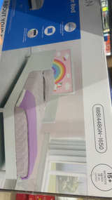 Delta Children Sleep and Play Toddler Bed, Unicorn/Rainbow - Image 1