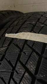 Bridgestone Blizzak DM-V2 Snow Tire - Image 1