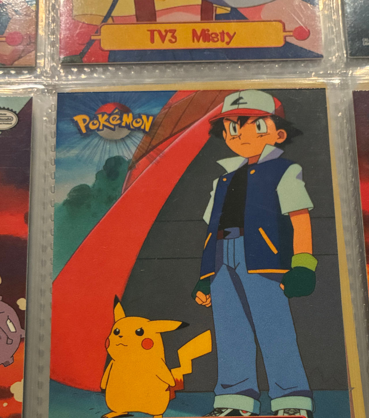 1999 Topps Pokémon Series 1 Ash & Pikachu TV1