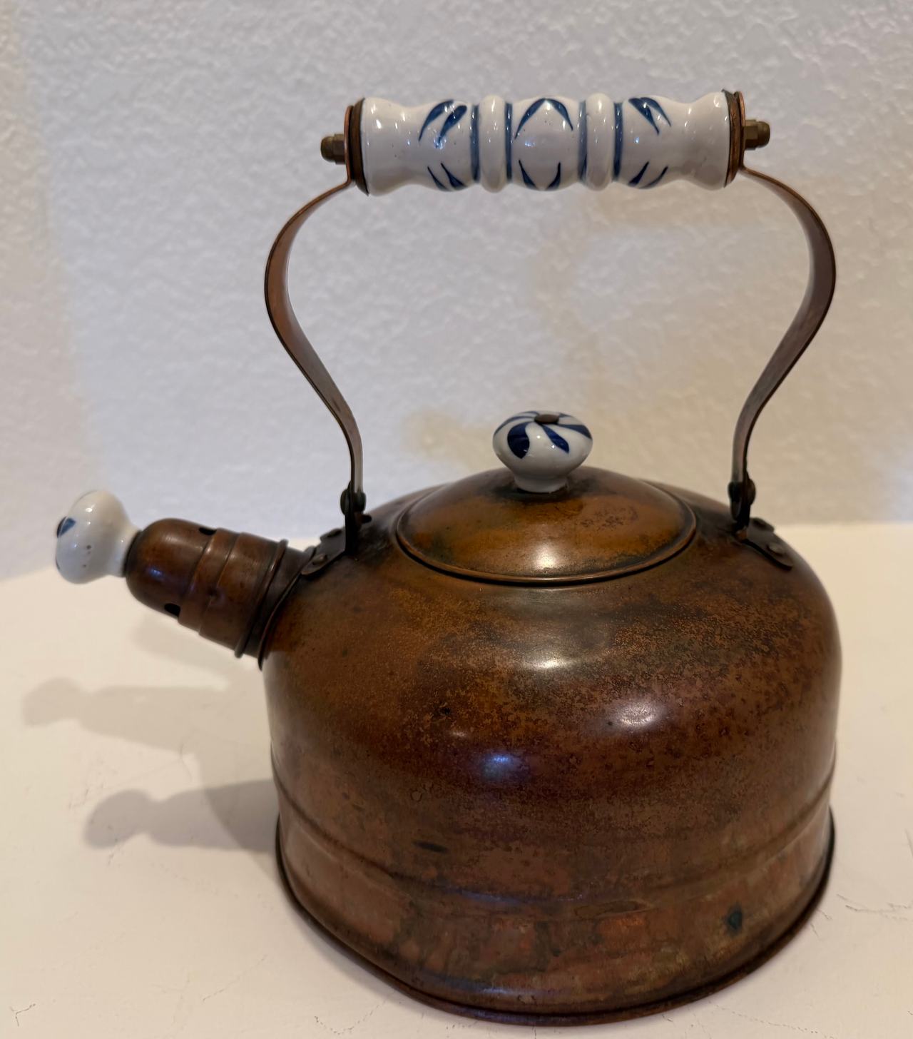 Vintage Copper Tea Kettle with Blue and White Ceramic Accents