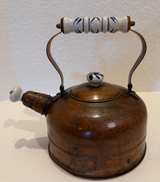 Vintage Copper Tea Kettle with Blue and White Ceramic Accents - Image 1