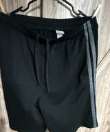 Large Black Champion Men's Athletic Shorts with Side Stripes - Image 1