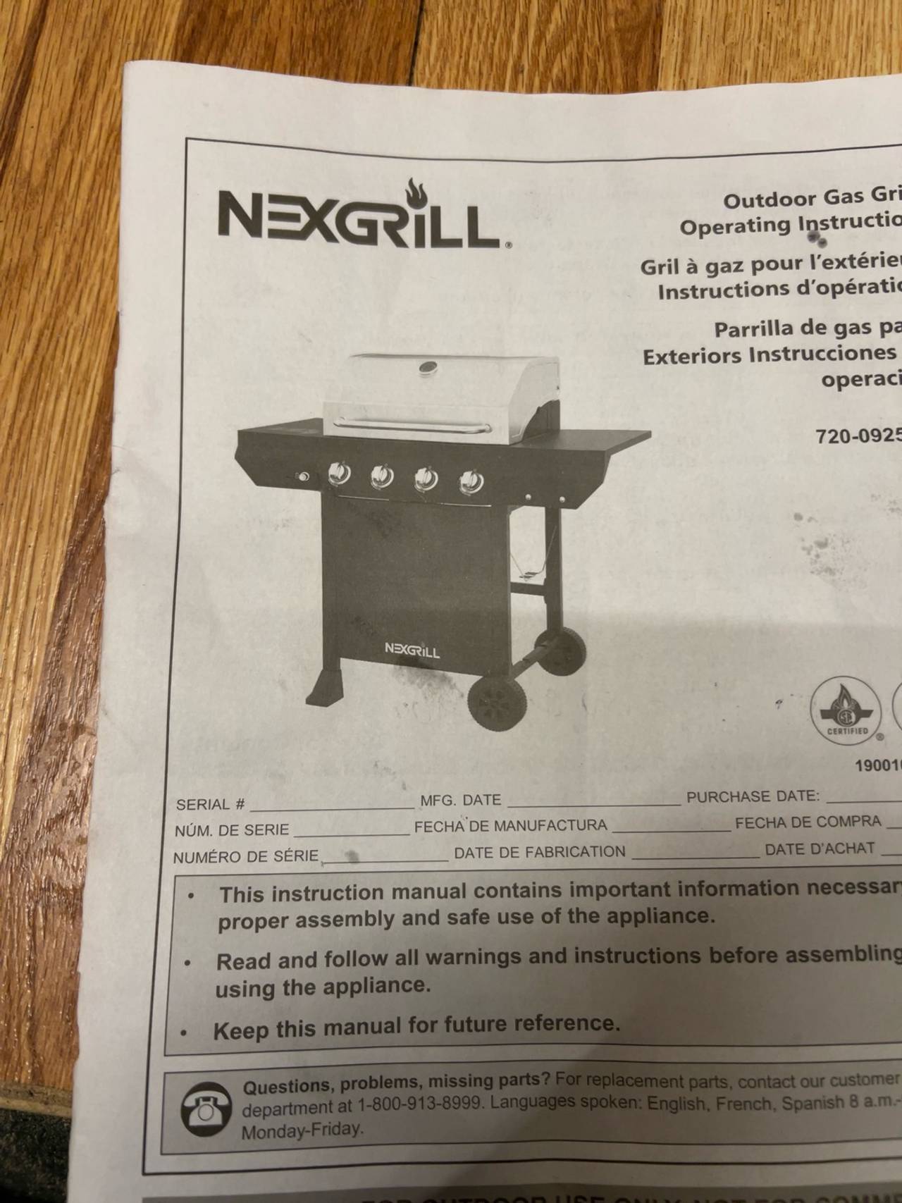 Nexgrill 4-Burner Propane Gas Grill Black with Stainless Steel Lid
