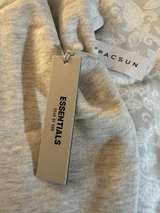 Fear of God Essentials Hoodie Oatmeal Heather - Image 2