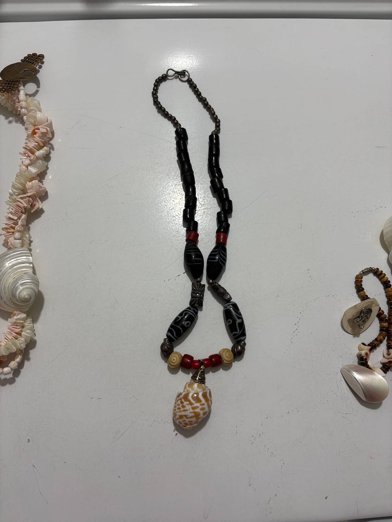 Handmade Tribal Beaded Necklace with Shell Pendant