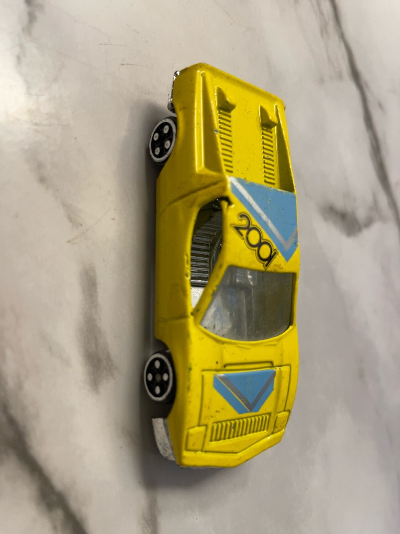 Maserati Merak SS Yellow Die-Cast Toy Car