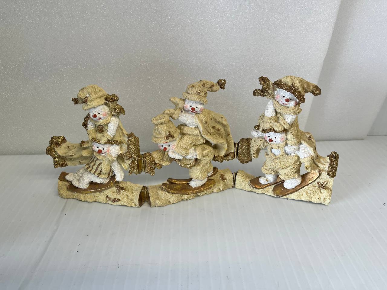 Glittery Skiing Snowmen Trio Figurine