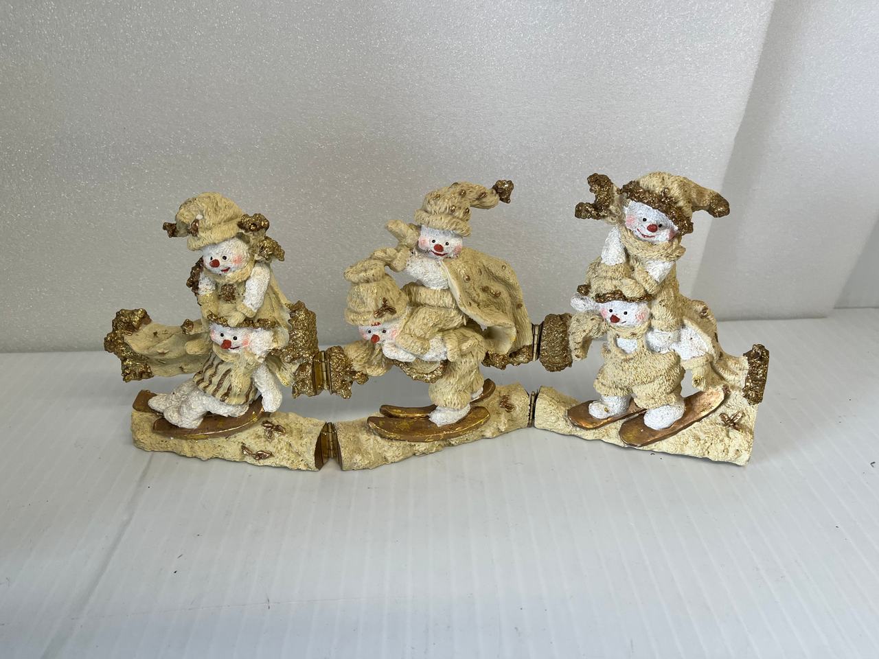 Glittery Skiing Snowmen Trio Figurine