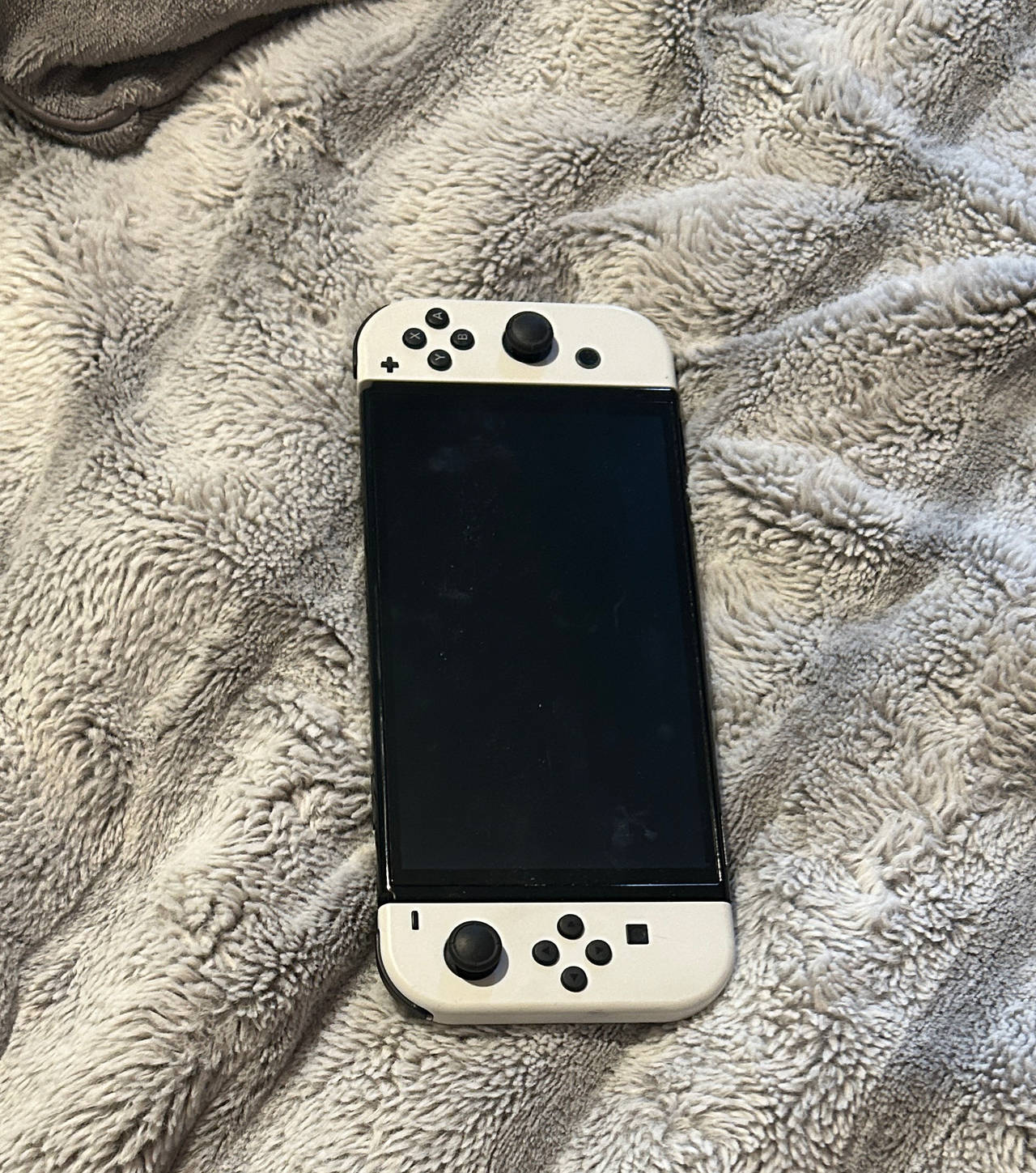 Nintendo Switch – OLED Model w/ White Joy-Con