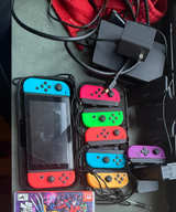 Nintendo Switch with Neon Blue and Neon Red Joy-Con - Image 1