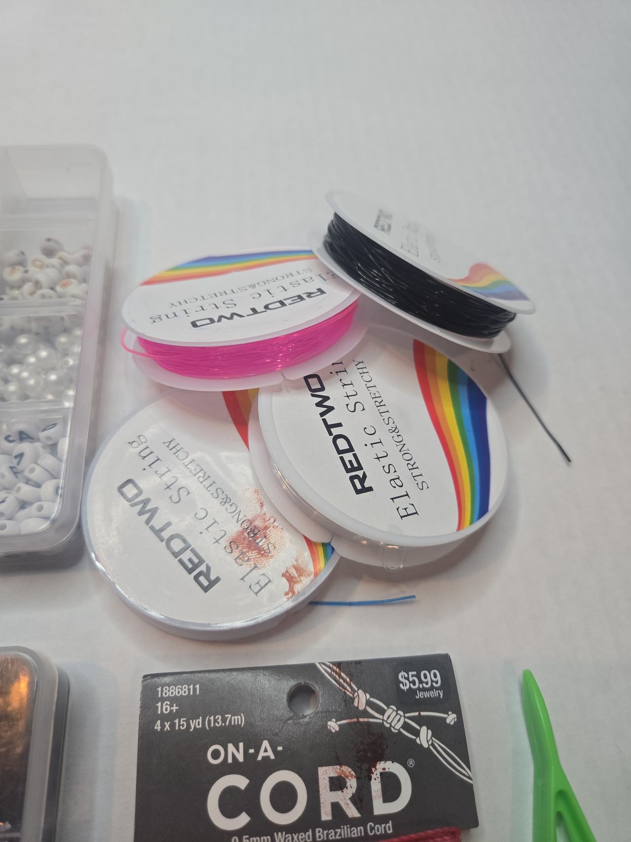 Heishi style Bead Jewelry Making Kit with Letter Beads and Cords.