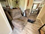 Ashley Power Reclining Sofa and Loveseat.   - Image 6