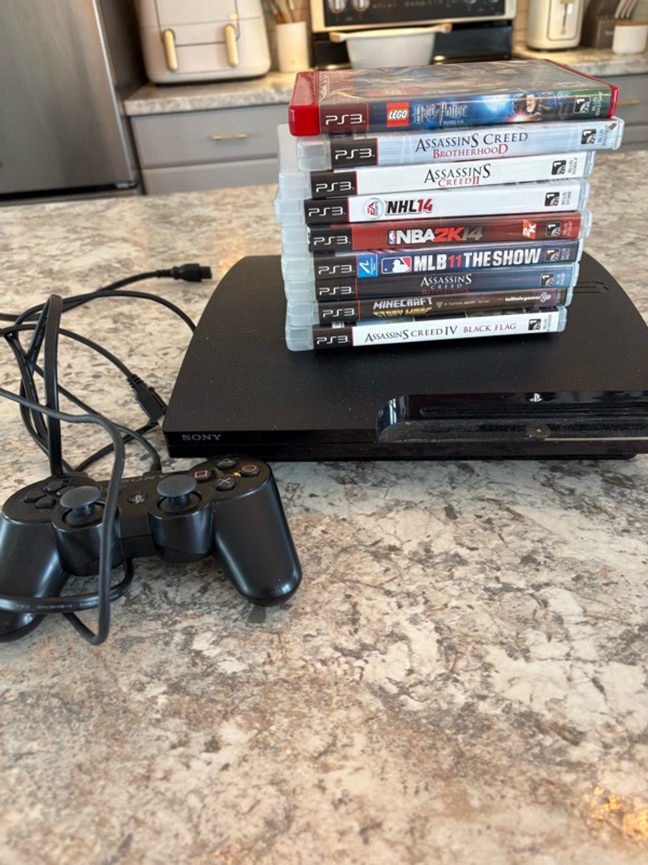 Sony PlayStation 3 Black with Games