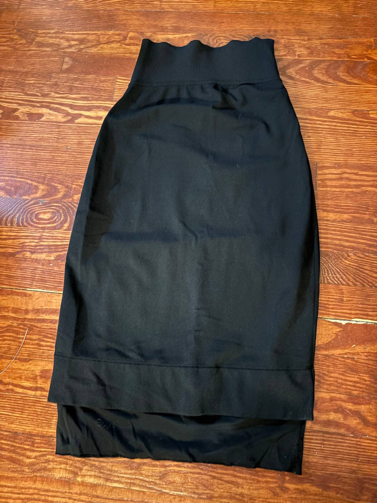 Givenchy Black midi skirt with slip detail, size small. New without tags